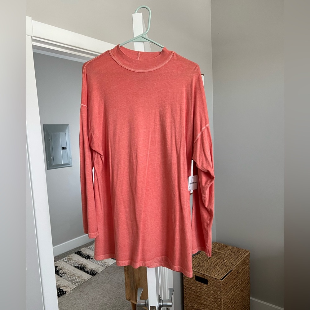 Free people long sleeve t shirt in coral, size small. Never worn!